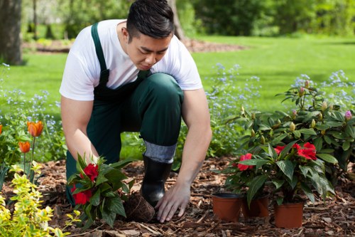 Gardening team managing site safety during outdoor work